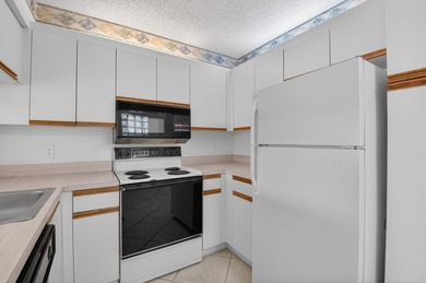 Enjoy tranquil lake views from this first-floor 3-bedroom - photo 10