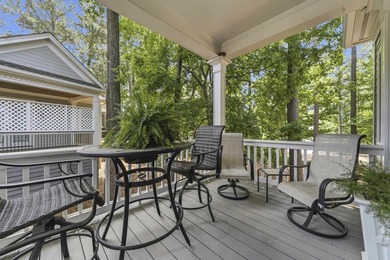 Located in Reynolds Landing, this lakeview home offers access to - photo 33