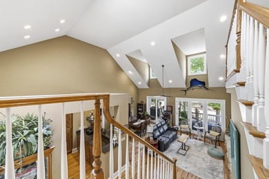 Located in Reynolds Landing, this lakeview home offers access to - photo 34