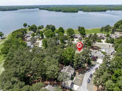 Located in Reynolds Landing, this lakeview home offers access to - photo 42