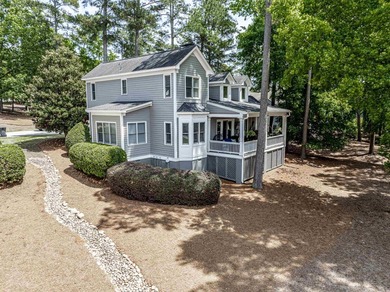 Located in Reynolds Landing, this lakeview home offers access to - photo 43