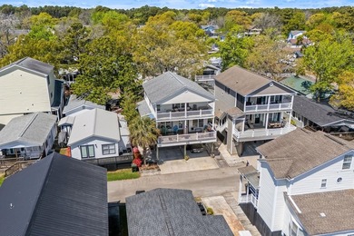 WELL BUILT 4 BED/3 BATH RAISED BEACH HOUSE IN THE HIGHLY SOUGHT - photo 4