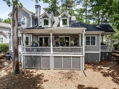 Located in Reynolds Landing, this lakeview home offers access to - photo 45