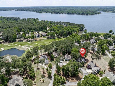 Located in Reynolds Landing, this lakeview home offers access to - photo 47