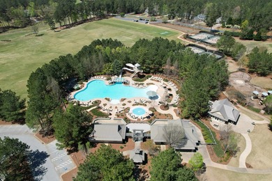 Located in Reynolds Landing, this lakeview home offers access to - photo 49