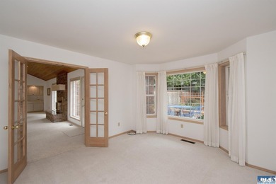 One level, 3 bedroom, 2 bath home with a den, located on the - photo 16