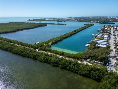 Nestled along the serene waterfront, these two picturesque - photo 4