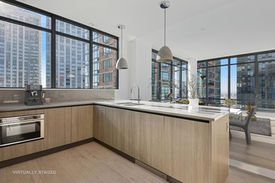 Residence 3307 is a penthouse-level 2-bedroom, 2-bath home at - photo 3