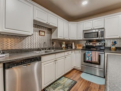 Lake life is calling-and this 4 bedroom, 2-bath home answers! - photo 13