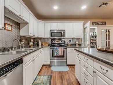 Lake life is calling-and this 4 bedroom, 2-bath home answers! - photo 14