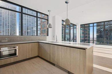 Residence 3307 is a penthouse-level 2-bedroom, 2-bath home at - photo 7