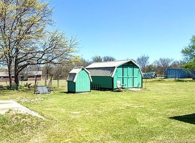 Lake life is calling-and this 4 bedroom, 2-bath home answers! - photo 34