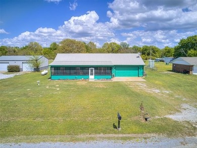 Lake life is calling-and this 4 bedroom, 2-bath home answers! - photo 37
