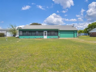 Lake life is calling-and this 4 bedroom, 2-bath home answers! - photo 39