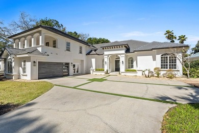 Elegantly positioned on a rare oversized waterfront corner lot - photo 11