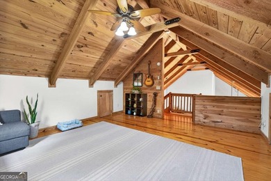 Fully furnished true log home on 5.78 private wooded acres in - photo 11