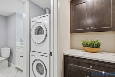 This is not your typical Hathaway Tower condominium! The