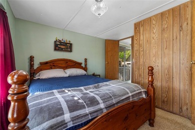 Tucked into a quiet waterfront community, this well-kept home - photo 13