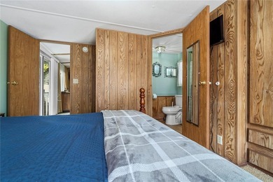 Tucked into a quiet waterfront community, this well-kept home - photo 14