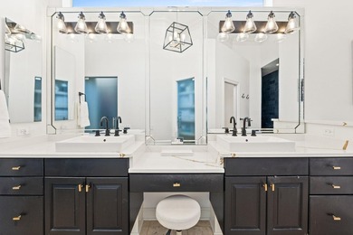 Elegantly positioned on a rare oversized waterfront corner lot - photo 15
