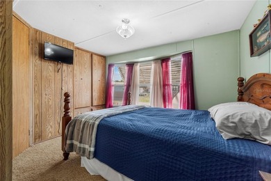 Tucked into a quiet waterfront community, this well-kept home - photo 15