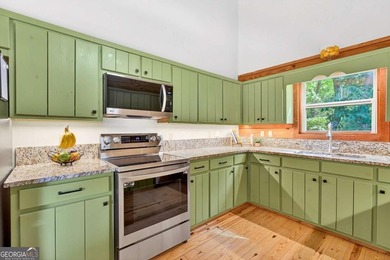 Fully furnished true log home on 5.78 private wooded acres in - photo 15