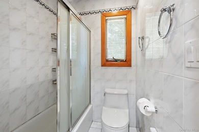Welcome to this beloved split-level home in the heart of Wantagh - photo 15