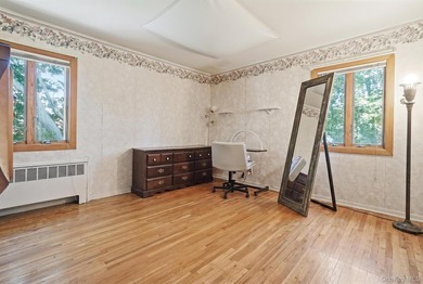 Welcome to this beloved split-level home in the heart of Wantagh - photo 16