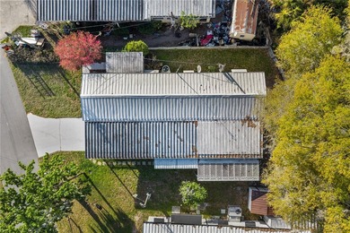 Tucked into a quiet waterfront community, this well-kept home - photo 17