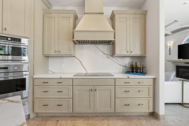 Elegantly positioned on a rare oversized waterfront corner lot - photo 18