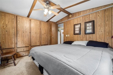 Tucked into a quiet waterfront community, this well-kept home - photo 18