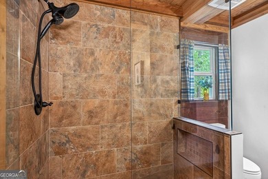 Fully furnished true log home on 5.78 private wooded acres in - photo 19