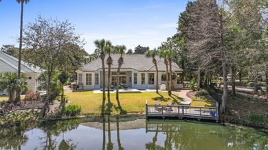 Elegantly positioned on a rare oversized waterfront corner lot - photo 25