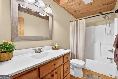 Fully furnished true log home on 5.78 private wooded acres in - photo 26