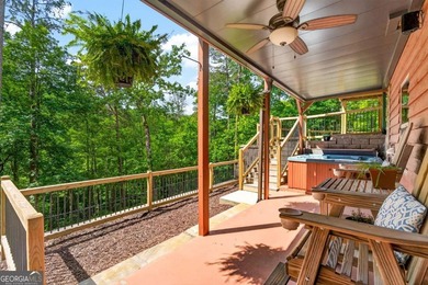 Fully furnished true log home on 5.78 private wooded acres in - photo 39