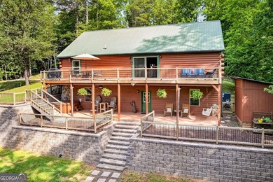 Fully furnished true log home on 5.78 private wooded acres in - photo 42