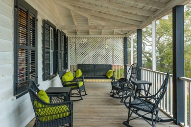 Tucked beneath a canopy of majestic live oaks along the serene - photo 7