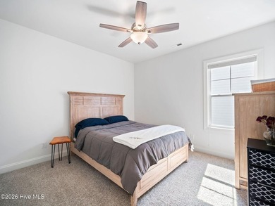 Some homes check boxes. This one sets standards. Nestled in the - photo 32