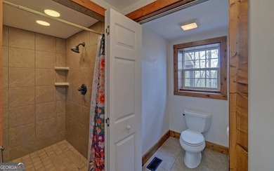 Step into this 3-bedroom, 3.5-bath mountain retreat in scenic - photo 55