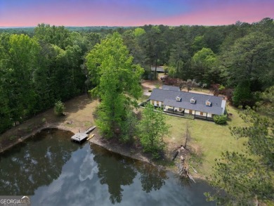 Lake Home For Sale in Jenkinsburg, Georgia