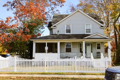 Single Family Home with white Picket Fence - Detached One Car - photo 1
