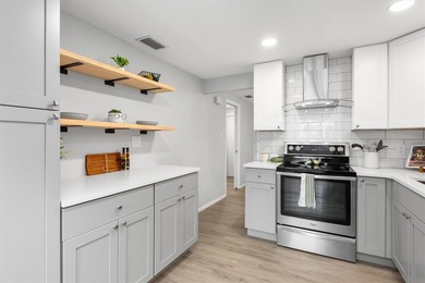 Virtually Staged. Welcome to this updated 2-bedroom, 2-bath home - photo 11