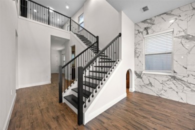 Welcome to the pinnacle of refined living in the exclusive gated - photo 3