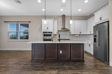 Welcome to the pinnacle of refined living in the exclusive gated - photo 8