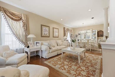 This stunning two-story single-family home is nestled in the - photo 2