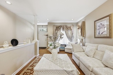 This stunning two-story single-family home is nestled in the - photo 3