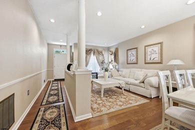 This stunning two-story single-family home is nestled in the - photo 4
