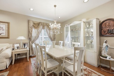 This stunning two-story single-family home is nestled in the - photo 5