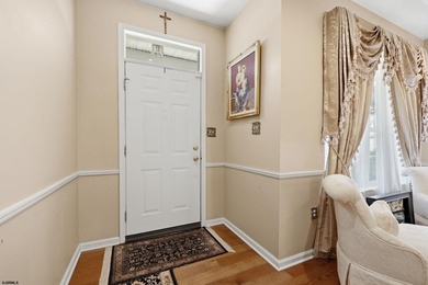 This stunning two-story single-family home is nestled in the - photo 6