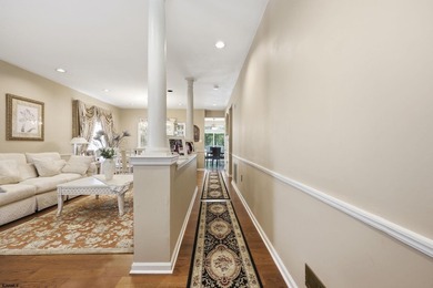 This stunning two-story single-family home is nestled in the - photo 7